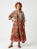 Vestido Violeta Cortés con Estampado Mixto y Bolsillos