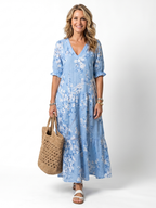 Vestido Violeta Cortés con Estampado Floral y Cordones
