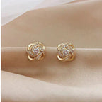 Lourdes - Pendientes Dorados de Espiral con Cristales