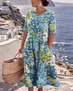 Vestido Violeta Cortés con Estampado Floral Ligero de Verano