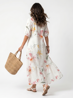 Vestido Violeta Cortés con Falda Escalonada Floral