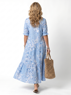Vestido Violeta Cortés con Estampado Floral y Cordones