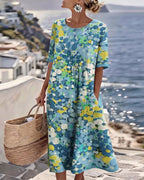 Vestido Violeta Cortés con Estampado Floral Ligero de Verano