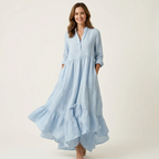 Jilana | Vestido largo con cuello alto, botones delanteros y bajo con volantes